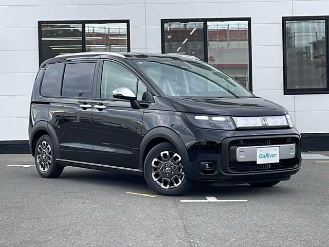 ホンダ フリード ハイブリット e:HEV クロスター 山口県 2025(令7)年 0.1千km クリスタルブラックパール 純正ナビ/・AM/FM/USB/Apple CarPlay/Android Auto/Bluetooth/フルセグテレビ/バックカメラ/ブラインドスポットモニター/純正アルミホイール/ハーフレザーシート/前席シートヒーター/サーキュレーター/USBチャージャー/両側パワースライドドア/スマートキー・スペアキー有/プッシュアップスタート/LEDヘッドランプ/フォグランプ/オートライト/ホンダセンシング/・衝突被害軽減ブレーキ/・追従有クルーズコントロール/・車線維持支援システム/・横滑り防止装置/盗難防止装置/ダブルサイドカーテンエアバッグ/取扱説明書/保証書