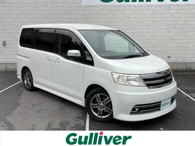 日産 セレナ ライダーS 静岡県 2006(平18)年 11万km ホワイトパール 純正ナビ　/後席モニター　/・ＴＶ　/・ＤＶＤ再生　/・ＣＤ再生　/両側スライドドア　/リモコンキー　/ＥＴＣ　/純正フロアマット　/純正アルミホイール　/電動格納ミラー　/取扱説明書　/保証書