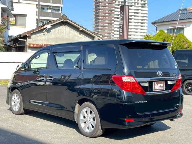 トヨタ アルファード 240G 宮崎県 2012(平24)年 11.1万km ブラック 純正フリップダウンモニター/純正メモリーナビ/フルセグTV：Bluetooth：DVD：CD/バックカメラ/両側パワースライドドア/前席パワーシート/運転席メモリー付きパワーシート/前後ドライブレコーダー/クルーズコントロール/コーナーセンサー/ウッドコンビハンドル/プッシュスタート/スマートキー/ETC/保証書・取扱説明書