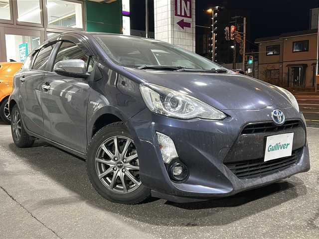 トヨタ アクア S 道央・札幌 2015(平27)年 8.2万km ダークバイオレットマイカメタリック 純正ナビ（AM/FM/CD/DVD/SD/TVフルセグ/BT）/ドライブレコーダー前後/バックカメラ/ETC/オートエアコン/シートヒーター（前席）/横滑り防止装置/エコモード/EVモード/nanoe搭載/プッシュスタート/電動格納ミラー/オートライト/ISOFIX