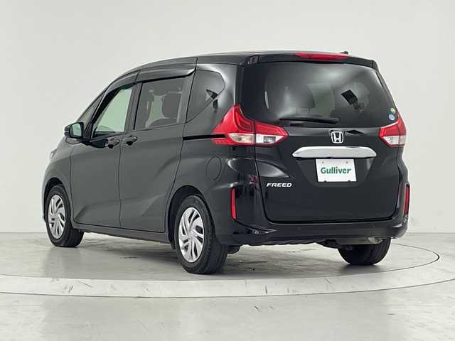 ホンダ フリード G ホンダセンシング 大阪府 2020(令2)年 5.2万km クリスタルブラックパール ホンダセンシング/　・衝突軽減ブレーキ/　・誤発進抑制機能/　・後方誤発進抑制機能/　・路外逸脱抑制機能/　・アダプティブ・クルーズ・コントロール/　・車線維持支援システム/　・先行車発進お知らせ機能/　・標識認識機能/社外ナビ/　（Bluetooth/CD）/フルセグTV/バックカメラ/両側パワースライドドア/シートヒーター/オートライト/純正フロアマット/スマートキー/ETC