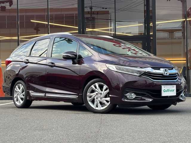 ホンダ シャトル ハイブリッド Z 宮城県 2015(平27)年 6.7万km ミスティックガーネットP 登録時走行距離67007km/純正ナビ/フルセグTV/CD/DVD/Bluetooth/ドライブレコーダー/ETC/バックカメラ/シートヒーター/寒冷地仕様/純正フロアマット/パドルシフト/ステアリングリモコン/オートライト/追従クルーズコントロール/LED