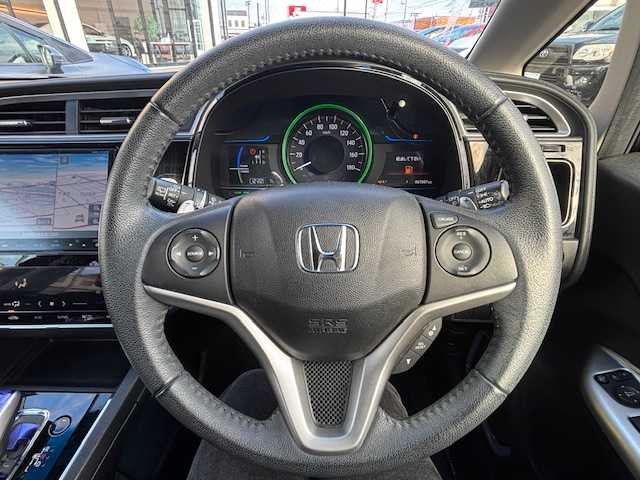 ホンダ シャトル ハイブリッド Z 宮城県 2015(平27)年 6.7万km ミスティックガーネットP 登録時走行距離67007km/純正ナビ/フルセグTV/CD/DVD/Bluetooth/ドライブレコーダー/ETC/バックカメラ/シートヒーター/寒冷地仕様/純正フロアマット/パドルシフト/ステアリングリモコン/オートライト/追従クルーズコントロール/LED