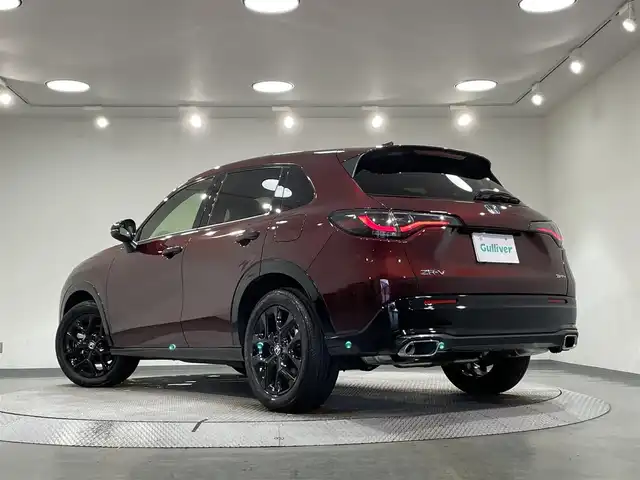ホンダ ＺＲ－Ｖ ハイブリッド e:HEV Z ブラックスタイル 愛知県 2024(令6)年 0.2万km ワイン カラーコード【R578M】プレミアムクリスタルガーネットM/純正９インチナビ　/(FM/AM/USB/Bluetooth/CarPlay/フルセグTV)/ＢＯＳＥサウンド　/マルチビューカメラ　　/ホンダセンシング/　　-衝突軽減ブレーキ/　　-路外逸脱抑制機能/　　-渋滞追従機能付アダプティブクルーズコントロール/　　-車線維持支援システム/　　-渋滞運転支援機能/　　-先行車発進お知らせ機能/　　-標識認識機能/　　-オートハイビーム/　　-ブラインドスポットインフォメーション/　　-パーキングセンサーシステム/本革シート　/ビルトインＥＴＣ２．０　/全席シートヒーター　/LEDヘッドライト/パワーバックドア　/ワイヤレス充電　/ステアリングヒーター/メモリー機能付電動パワーシート/パドルシフト/オートブレーキホールド機能