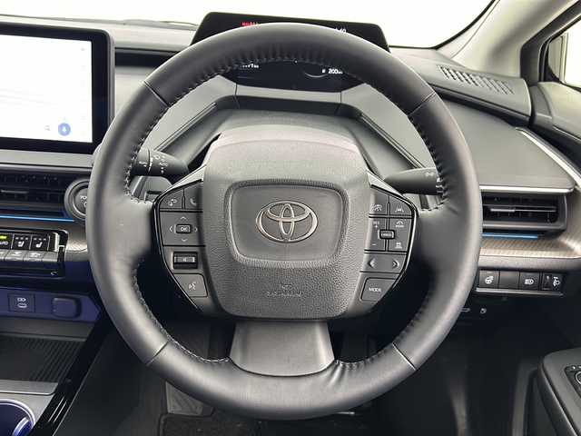 トヨタ プリウス Z 愛知県 2023(令5)年 1.1万km アティチュードブラックマイカ 禁煙車/純正12.3インチディスプレイオーディオ/フルセグTV/Bluetooth/全方位カメラ/バックカメラ/ブラインドスポットモニター/ビルトインETC2.0/衝突被害軽減システム/クリアランスソナー/パーキングアシスト/レーンキープアシスト/横滑り防止装置/レーダークルーズコントロール/LEDヘッドライト/フォグランプ/オートライト/オートマチックハイビーム/合皮シート/前席シートヒーター/前席エアシート/運転席パワーシート/運転席シートメモリ/パワーバックドア/ワイヤレス充電/エンジンスタートボタン/スマートキー/純正フロアマット/純正19インチアルミホイール/MODELLISTA製エアロ(フロント、サイド、リア)