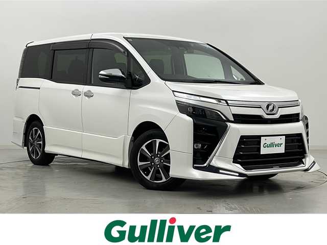 トヨタ ヴォクシー ZS 煌Ⅱ 宮城県 2019(令1)年 5.2万km ホワイトパールクリスタルシャイン TRDエアロ（FSR）/Toyota Safety Sense /・プリクラッシュセーフティ/・レーンディパーチャーアラート/・オートマチックハイビーム/クルーズコントロール/純正10インチSDナビ/・CD.DVD.BT.USB.HDMI.SD/バックカメラ/フルセグTV/両側パワースライドドア/ビルトインETC2.0/ドライブレコーダー（FR）/ステアリングスイッチ/プッシュスタート/スマートキー/アイドリングストップ/LEDヘッドライト/LEDフォグライト/純正フロアマット/純正16インチAW/横滑り防止/ロールサンシェード/シートバックテーブル