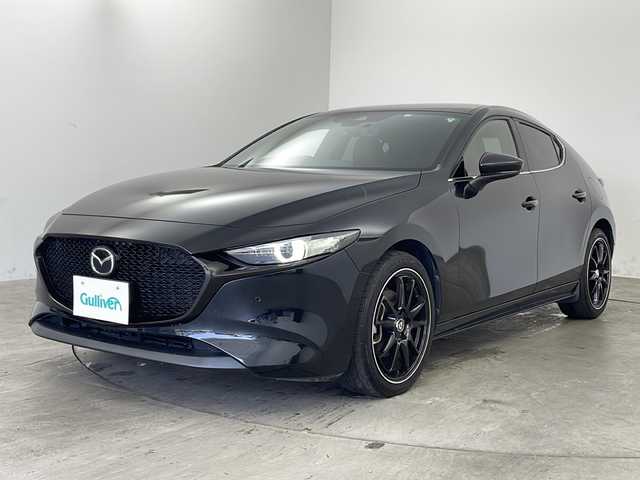マツダ マツダ３ファストバック XD バーガンディセレクション 兵庫県 2020(令2)年 7.4万km ジェットブラックマイカ ・純正ナビ/CD/DVD/USB/HDMI/Bluetooth/TV/・衝突軽減ブレーキ/・横滑り防止装置/・レーダークルーズコントロール/・クリアランスソナー/・前後コーナーセンサー/・バックカメラ/・電動パーキングブレーキ/・オートホールド/・パドルシフト/・ブラインドスポットモニター/・アイドリングストップ/・オートマチックハイビーム/・メモリー付きパワーシート/・前後ドライブレコーダー/・ステアリングヒーター/・ビルトインETC/・純正フロアマット/・スマートキー/・プッシュスタートボタン/・W＋サイドエアバッグ/・カーテンエアバッグ