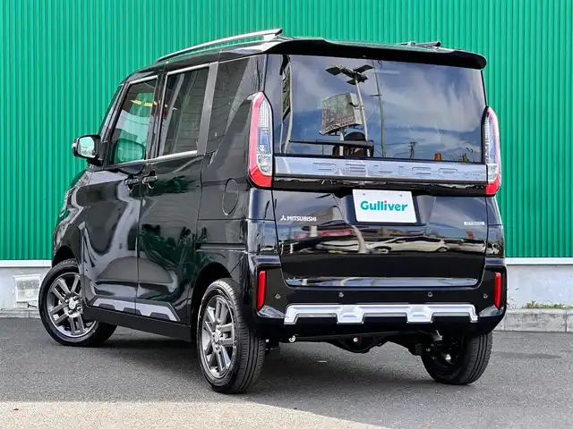 三菱 デリカミニ T プレミアム 宮城県 2025(令7)年 0.1千km アメジストブラック T　PREMIUM　4WD　/サイドデカール/＝＝＝/e-Assist/・衝突被害軽減ブレーキ/・踏み間違い衝突防止アシスト/・車線逸脱警報システム/・車線逸脱防止支援機能/・オートマチックハイビーム/・ふらつき警報/・前方衝突予測警報/・標識検知システム/・先行車発進通知/マイパイロット（レーダークルーズコントロール/車線維持支援）/デジタルルームミラー/マルチアラウンドモニター/純正9型ディスプレイオーディオ/・Bluetooth/・AppleCarPlay/AndroidAuto/ハンズフリー両側パワースライドドア/ハーフレザーシート/シートヒーター/ステアリングヒーター/革巻きステアリング/ステアリングスイッチ/パドルシフト/電動パーキングブレーキ/ブレーキホールド/LEDヘッドランプ/フォグランプ/オートライト/スマートキー＆プッシュスタート/スペアキー/電動格納ミラー/ルーフレール/純正15インチAW/W/サイド/カーテンエアバッグ