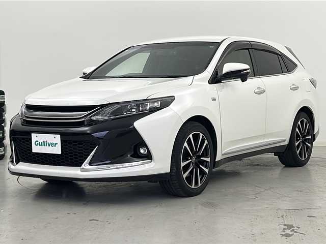 トヨタ ハリアー エレガンス G’s 宮城県 2016(平28)年 7万km ホワイトパールクリスタルシャイン 禁煙車/アルパイン製9インチナビ/・CD/DVD/BT/SD/フルセグTV/バックカメラ/ハーフレザーシート/ビルトインETC/ドライブレコーダー（F/R）/LEDヘッドライト/LEDフォグランプ/プッシュスタート/スマートキー/横滑り防止装置/アイドリングストップ/純正19インチアルミホイール/純正ドアバイザー/オートエアコン/MTモード付AT/電動格納ミラー