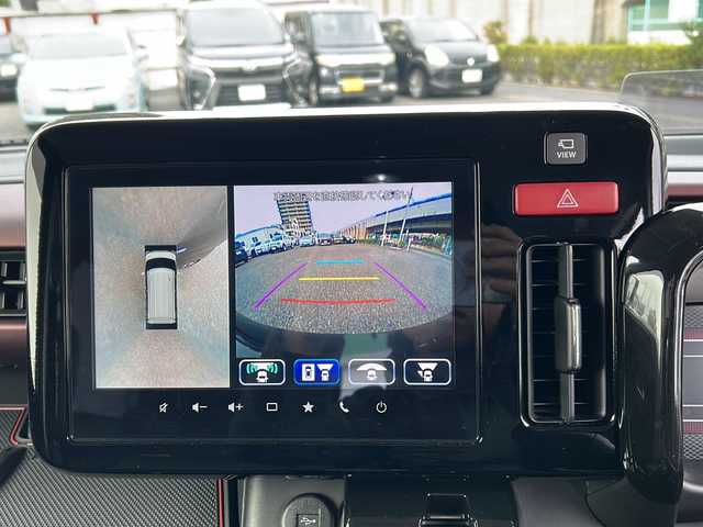 スズキ スペーシア カスタム HYBRID XS ターボ 東京都 2024(令6)年 1万km ブルーイッシュブラックパール3 純正ナビ連動メモリナビ　/【Bluetooth/フルセグTV/AM/FM】/ETC/バックカメラ/全方位モニター　/デュアルサポートブレーキ/車線逸脱警報装置/アダプティヴクルーズコントロール/ハイビームアシスト/クリアランスソナー/標識認識機能/ヘッドアップディスプレイ/両側パワースライドドア　/ハンドルヒーター/パドルシフト/D/N席シートヒーター/プッシュスタート/スマートキー×2　