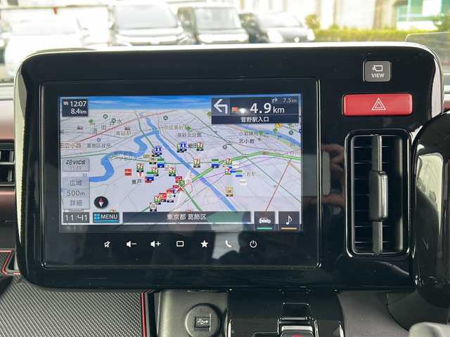 スズキ スペーシア カスタム HYBRID XS ターボ 東京都 2024(令6)年 1万km ブルーイッシュブラックパール3 純正ナビ連動メモリナビ　/【Bluetooth/フルセグTV/AM/FM】/ETC/バックカメラ/全方位モニター　/デュアルサポートブレーキ/車線逸脱警報装置/アダプティヴクルーズコントロール/ハイビームアシスト/クリアランスソナー/標識認識機能/ヘッドアップディスプレイ/両側パワースライドドア　/ハンドルヒーター/パドルシフト/D/N席シートヒーター/プッシュスタート/スマートキー×2　