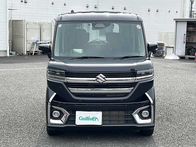 スズキ スペーシア カスタム HYBRID XS ターボ 東京都 2024(令6)年 1万km ブルーイッシュブラックパール3 純正ナビ連動メモリナビ　/【Bluetooth/フルセグTV/AM/FM】/ETC/バックカメラ/全方位モニター　/デュアルサポートブレーキ/車線逸脱警報装置/アダプティヴクルーズコントロール/ハイビームアシスト/クリアランスソナー/標識認識機能/ヘッドアップディスプレイ/両側パワースライドドア　/ハンドルヒーター/パドルシフト/D/N席シートヒーター/プッシュスタート/スマートキー×2　