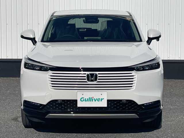 ホンダ ヴェゼル ハイブリッド e:HEV Z 千葉県 2025(令7)年 0.1千km プラチナホワイトパール 純正９インチコネクトナビ/(フルセグTV/BT/AppleCarPlay/AndroidAuto)/ブラインドスポットモニター/衝突被害軽減システム/車線逸脱警報/バックカメラ/クルーズコントロール/電動リアゲート/ハーフレザーシート/横滑り防止装置/ビルトインETC2.0/ワイヤレス充電/LEDヘッドライト/フォグランプ/オートライト/ウィンカーミラー/電動格納ミラー/純正18インチAW/シートヒーター/シートリフター/プッシュスタート/スマートキー/スペアキー/取扱説明書/保証書