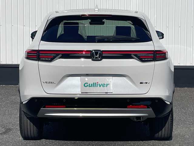 ホンダ ヴェゼル ハイブリッド e:HEV Z 千葉県 2025(令7)年 0.1千km プラチナホワイトパール 純正９インチコネクトナビ/(フルセグTV/BT/AppleCarPlay/AndroidAuto)/ブラインドスポットモニター/衝突被害軽減システム/車線逸脱警報/バックカメラ/クルーズコントロール/電動リアゲート/ハーフレザーシート/横滑り防止装置/ビルトインETC2.0/ワイヤレス充電/LEDヘッドライト/フォグランプ/オートライト/ウィンカーミラー/電動格納ミラー/純正18インチAW/シートヒーター/シートリフター/プッシュスタート/スマートキー/スペアキー/取扱説明書/保証書
