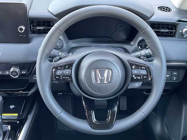 ホンダ ヴェゼル ハイブリッド e:HEV Z 千葉県 2025(令7)年 0.1千km プラチナホワイトパール 純正９インチコネクトナビ/(フルセグTV/BT/AppleCarPlay/AndroidAuto)/ブラインドスポットモニター/衝突被害軽減システム/車線逸脱警報/バックカメラ/クルーズコントロール/電動リアゲート/ハーフレザーシート/横滑り防止装置/ビルトインETC2.0/ワイヤレス充電/LEDヘッドライト/フォグランプ/オートライト/ウィンカーミラー/電動格納ミラー/純正18インチAW/シートヒーター/シートリフター/プッシュスタート/スマートキー/スペアキー/取扱説明書/保証書