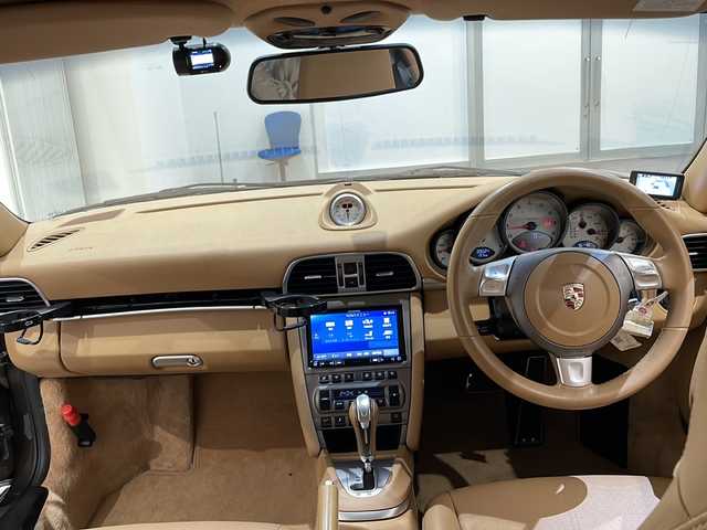 ポルシェ ９１１ カレラS 新潟県 2009(平21)年 3.9万km 茶 レッドキャリパー/電動リアスポイラー/19インチAW/茶革シート/シートヒーター/社外メモリナビ/(CD/DVD/Bluetooth/フルセグTV)/バックカメラ/ETC/ドライブレコーダー/パドルシフト/リモコンキー/保証書