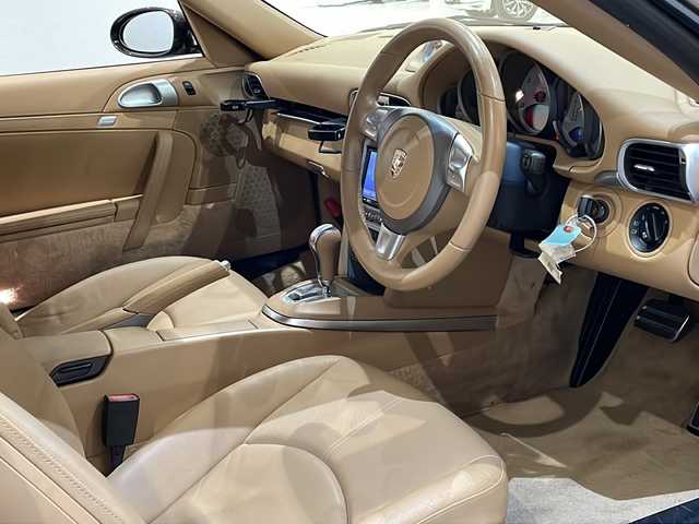 ポルシェ ９１１ カレラS 新潟県 2009(平21)年 3.9万km 茶 レッドキャリパー/電動リアスポイラー/19インチAW/茶革シート/シートヒーター/社外メモリナビ/(CD/DVD/Bluetooth/フルセグTV)/バックカメラ/ETC/ドライブレコーダー/パドルシフト/リモコンキー/保証書