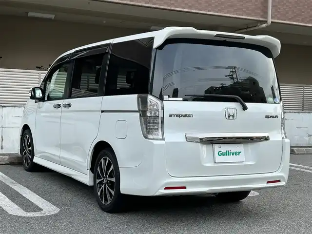 ホンダ ステップワゴン スパーダ Z クールスピリット 大阪府 2013(平25)年 9.7万km ホワイトオーキッドパール ワンオーナー/純正Gathers 9インチナビ　(VXM-135VFNi)/・バックカメラ/・フルセグテレビ（走行中視聴可能）/・CD/DVD/・Bluetooth/・AM/FM/両側パワースライドドア/クルーズコントロール/ドライブレコーダー（DRV-320）/ビルトインETC/オートライト/横滑り防止装置/革巻きステアリング/パドルシフト（MTモード付AT)/ハーフレザーシート/純正フロアマット/純正17インチアルミホイール/スペアキー1本