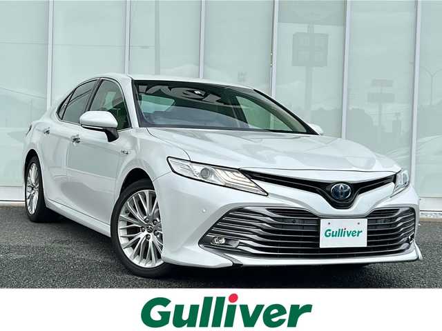 トヨタ カムリ G レザーパッケージ 福岡県 2018(平30)年 6.4万km プラチナホワイトパールマイカ 純正ナビ（BT/AM/FM/DISC/SD/SDREC/AUX/BR/フルセグ）/バックカメラ/レーダークルーズコントロール/LEDヘッドライト/オートマチックハイビーム/オートライト/フォグランプ/レザーシート/DN席シートヒーター/DN席パワーシート/純正18インチAW/DUALオートエアコン/ステアリングスイッチ/BSM/RCTA/電動パーキングブレーキ/横滑り防止装置/盗難防止装置/レーンキープアシスト/TVキャンセラー/ISOFIX/オート電動格納ミラー/スマートキー/ETC/保証書/取扱説明書
