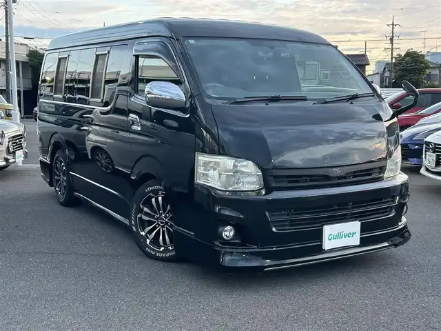 トヨタ ハイエース GL ロング 愛知県 2012(平24)年 13.2万km ブラックマイカ 純正ＳＤナビ　/アルパイン製リアモニター　/左パワースライドドア　/ＥＴＣ　/シートカバー　/社外ベットキット　/ＡＣ１００Ｖ　/Ｆドラレコ　/社外ホイール　/社外エアロＦ・Ｓ・Ｒ/社外マフラー