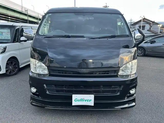 トヨタ ハイエース GL ロング 愛知県 2012(平24)年 13.2万km ブラックマイカ 純正ＳＤナビ　/アルパイン製リアモニター　/左パワースライドドア　/ＥＴＣ　/シートカバー　/社外ベットキット　/ＡＣ１００Ｖ　/Ｆドラレコ　/社外ホイール　/社外エアロＦ・Ｓ・Ｒ/社外マフラー