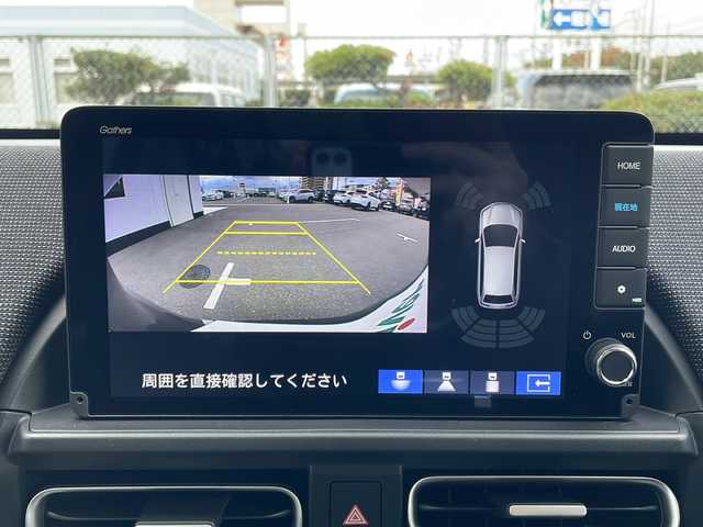 ホンダ フリード ハイブリット e:HEV AIR EX 山口県 2025(令7)年 0.1千km メテオロイドグレーメタリック 純正9インチナビ(LXM-242ZFNI)/【Bluetooth/フルセグTV/Apple CarPlay/Android Auto】/ホンダセンシング/・衝突軽減ブレーキ（CMBS）/・先行車発進お知らせ機能/・歩行者事故低減ステアリング/・路外逸脱抑制機能/・標識認識機能/・渋滞追従機能付アダプティブクルーズコントロール/・車線維持支援システム（LKAS）/・トラフィックジャムアシスト（渋滞運転支援機能）/・ブラインドスポットインフォメーション/・誤発進抑制機能/・後方誤発進抑制機能/・近距離衝突軽減ブレーキ/・急アクセル抑制機能/・パーキングセンサーシステム/・後退出庫サポート/・オートハイビーム/・アダプティブドライビングビーム/両側パワースライドドア/バックカメラ/LEDヘッドライト/D/Nシートヒーター/プッシュスタート/スマートキー/ステアリングリモコン