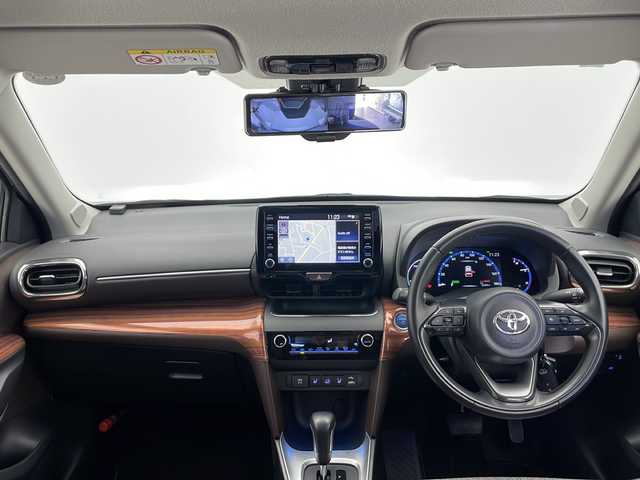 トヨタ ヤリスクロス ハイブリッド Z 長野県 2021(令3)年 2.7万km ホワイトパールクリスタルシャイン 4WD/純正ナビ/（フルセグ/Bluetooth/AppleCarPlay/AndroidAuto)/バックカメラ/社外デジタルインナーミラー/（前後ドラレコ付き）/ビルトインETC/衝突軽減ブレーキ/車線逸脱防止/レーダークルーズコントロール/前後コーナーセンサー/運転席パワーシート/ハーフレザーシート/社外AWスタッドレスタイヤ付き/社外木目調パネル/LEDヘッドライト/スマートキー/スペアキー