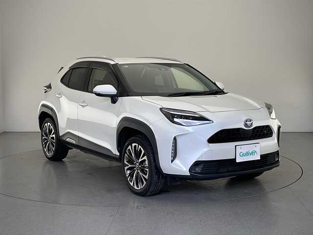 トヨタ ヤリスクロス ハイブリッド Z 長野県 2021(令3)年 2.7万km ホワイトパールクリスタルシャイン 4WD/純正ナビ/（フルセグ/Bluetooth/AppleCarPlay/AndroidAuto)/バックカメラ/社外デジタルインナーミラー/（前後ドラレコ付き）/ビルトインETC/衝突軽減ブレーキ/車線逸脱防止/レーダークルーズコントロール/前後コーナーセンサー/運転席パワーシート/ハーフレザーシート/社外AWスタッドレスタイヤ付き/社外木目調パネル/LEDヘッドライト/スマートキー/スペアキー