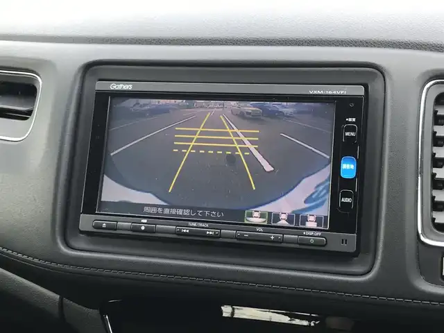 ホンダ ヴェゼル ハイブリッド X 鳥取県 2015(平27)年 6.9万km クリスタルブラックパール ワンオーナー/純正ナビ/フルセグ/CD/DVD/BT/USB/バックカメラ・ETC/シティブレーキアクティブシステム/クルーズコントロール/横滑り防止装置/電動パーキングブレーキ/LEDヘットライト/フォグライト/純正16インチアルミホイール/カーテンエアバッグ/パドルシフト/プッシュエンジンスタート/スペアキー/フロアマット/ドアバイザー