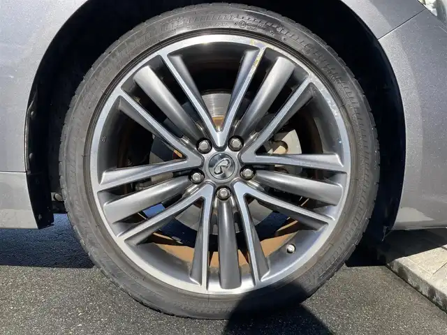 日産 スカイライン 200GT－t タイプSP 静岡県 2015(平27)年 8.1万km ダークメタルグレー エマージェンシーブレーキ/純正メーカーナビ/　AM FM CD DVD Bluetooth USB AUX/フルセグTV/ビルトインETC/前後方ドライブレコーダー/レーダークルーズコントロール/LEDオートヘッドランプ/パワーシート(前席)/シートヒーター(前席)/前後方クリアランスソナー/純正19インチアルミホイール/スマートキー2本/シングルサンルーフ/アラウンドビューモニター/ブラックレザーシート