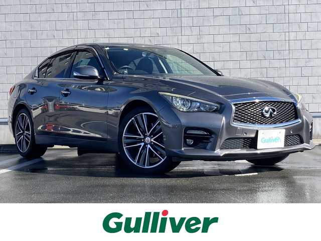 日産 スカイライン 200GT－t タイプSP 静岡県 2015(平27)年 8.1万km ダークメタルグレー エマージェンシーブレーキ/純正メーカーナビ/　AM FM CD DVD Bluetooth USB AUX/フルセグTV/ビルトインETC/前後方ドライブレコーダー/レーダークルーズコントロール/LEDオートヘッドランプ/パワーシート(前席)/シートヒーター(前席)/前後方クリアランスソナー/純正19インチアルミホイール/スマートキー2本/シングルサンルーフ/アラウンドビューモニター/ブラックレザーシート