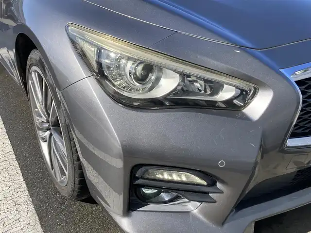 日産 スカイライン 200GT－t タイプSP 静岡県 2015(平27)年 8.1万km ダークメタルグレー エマージェンシーブレーキ/純正メーカーナビ/　AM FM CD DVD Bluetooth USB AUX/フルセグTV/ビルトインETC/前後方ドライブレコーダー/レーダークルーズコントロール/LEDオートヘッドランプ/パワーシート(前席)/シートヒーター(前席)/前後方クリアランスソナー/純正19インチアルミホイール/スマートキー2本/シングルサンルーフ/アラウンドビューモニター/ブラックレザーシート