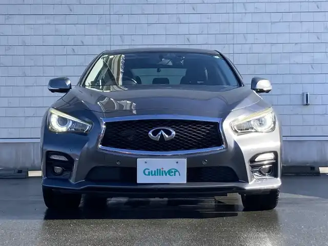 日産 スカイライン 200GT－t タイプSP 静岡県 2015(平27)年 8.1万km ダークメタルグレー エマージェンシーブレーキ/純正メーカーナビ/　AM FM CD DVD Bluetooth USB AUX/フルセグTV/ビルトインETC/前後方ドライブレコーダー/レーダークルーズコントロール/LEDオートヘッドランプ/パワーシート(前席)/シートヒーター(前席)/前後方クリアランスソナー/純正19インチアルミホイール/スマートキー2本/シングルサンルーフ/アラウンドビューモニター/ブラックレザーシート