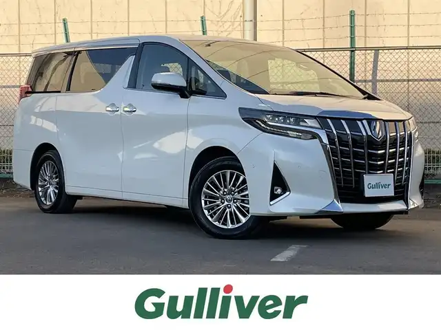 トヨタ アルファードハイブリット G Fパッケージ 東京都 2022(令4)年 6.1万km ホワイトパールクリスタルシャイン 純正10.5型ナビ/（CD/DVD/BT/USB）/全周囲カメラ/純正13.1インチフリップダウンモニター/JBLサウンド/純正ビルトインETC2.0/プリクラッシュセーフティ/クリアランスソナー/レーントレーシングアシスト/リヤクロストラフィックアラート/ブラインドスポットモニター/パーキングサポートブレーキ/デジタルインナーミラー/前後ドライブレコーダー/両側パワースライドドア/純正フロアマット/LEDヘッドライト/フロントフォグランプ/運転席メモリ付きパワーシート/前席シートヒーター/パワーバックドア