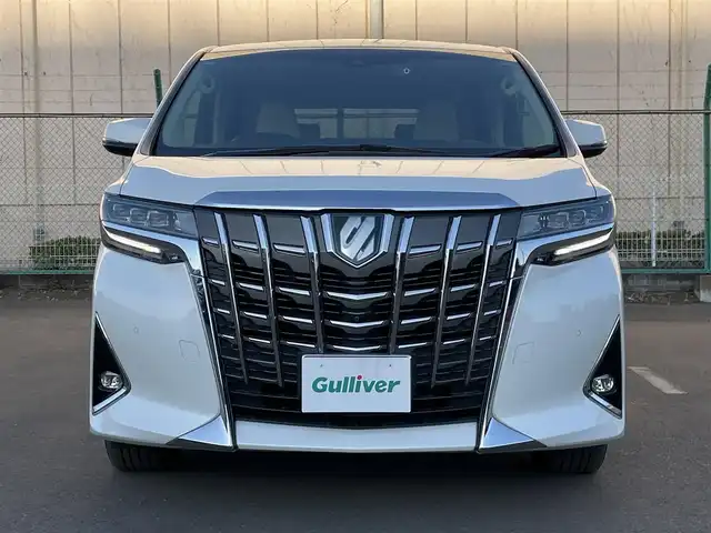 トヨタ アルファードハイブリット G Fパッケージ 東京都 2022(令4)年 6.1万km ホワイトパールクリスタルシャイン 純正10.5型ナビ/（CD/DVD/BT/USB）/全周囲カメラ/純正13.1インチフリップダウンモニター/JBLサウンド/純正ビルトインETC2.0/プリクラッシュセーフティ/クリアランスソナー/レーントレーシングアシスト/リヤクロストラフィックアラート/ブラインドスポットモニター/パーキングサポートブレーキ/デジタルインナーミラー/前後ドライブレコーダー/両側パワースライドドア/純正フロアマット/LEDヘッドライト/フロントフォグランプ/運転席メモリ付きパワーシート/前席シートヒーター/パワーバックドア
