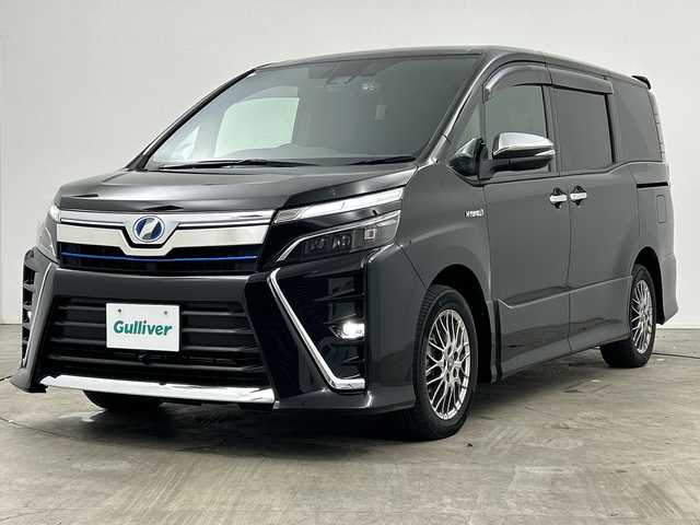 トヨタ ヴォクシー ハイブリッド ZS 煌 三重県 2018(平30)年 4.9万km ブラック /禁煙車//純正１０型ナビ(フルセグ/CD/DVD/BT/AM/FM)　//１２．８型フリップダウンモニター //バックカメラ //フロントカメラ//両側パワースライドドア//ドラレコ前後//シートヒーター //トヨタセーフティーセンス //クルコン //レーンキープアシスト //オートマチックハイビーム //LEDヘッドライト//ビルトインETC//ステアリングスイッチ