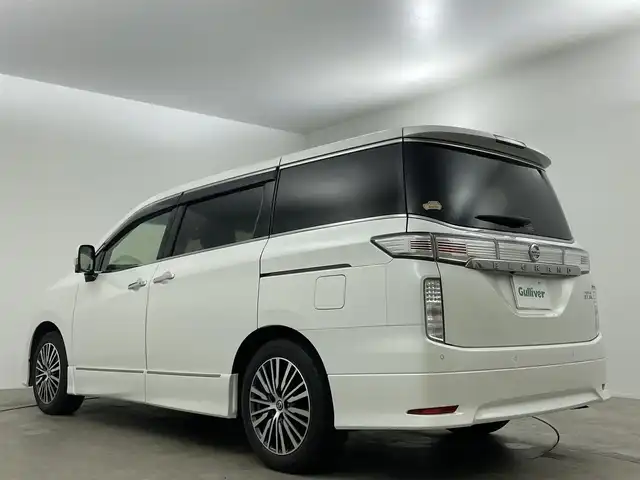 日産 エルグランド 250ハイウェイスターS 岡山県 2021(令3)年 1.7万km ピュアホワイトパール 純正１０インチナビ/（Bluetooth/フルセグTV/CD/DVD）/エマージェンシーブレーキ/デジタルインナーミラー/ドライブレコーダー（前）/レーダークルーズコントロール/アラウンドビューモニター/ビルトインＥＴＣ/ＬＥＤヘッドライト/オートハイビーム/ブラインドスポットモニター/電動リアゲート/オットマン/ウォークスルー/純正フロアマット/両側パワースライドドア/ドアバイザー/プッシュスタート/スマートキー×2/新車保証書/取扱説明書