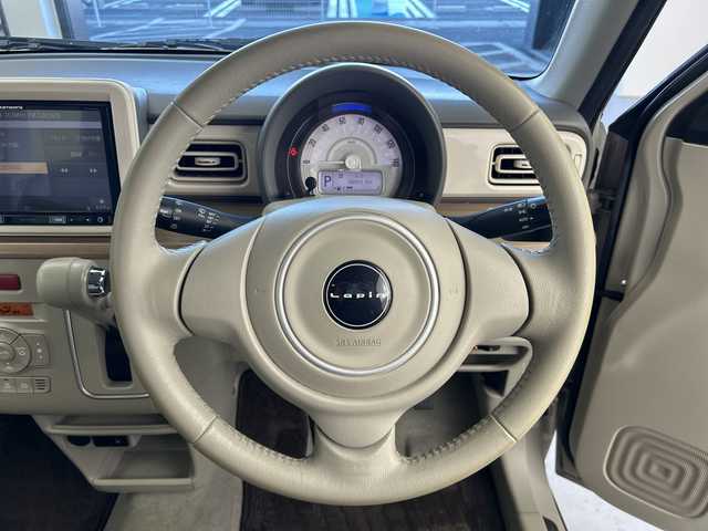 スズキ ラパン X 奈良県 2015(平27)年 6.8万km フォーンベージュメタリック/ホワイト2トーンルーフ 社外8インチナビ/フルセグTV/Bluetoothオーディオ/DVD再生/バックカメラ/衝突軽減ブレーキ/横滑り防止/デジタルインナーミラー型前後ドラレコ/エネチャージ/スマートキー/プッシュスタート/純正キセノンヘッドライト/運転席シートヒーター/ETC/アイドリングストップ/ウインカーミラー