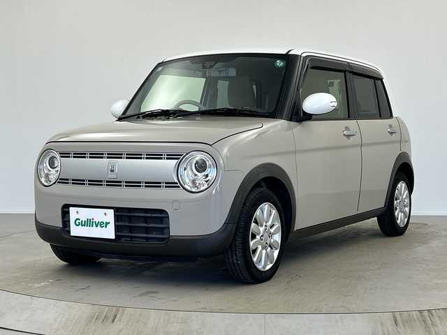 スズキ ラパン X 奈良県 2015(平27)年 6.8万km フォーンベージュメタリック/ホワイト2トーンルーフ 社外8インチナビ/フルセグTV/Bluetoothオーディオ/DVD再生/バックカメラ/衝突軽減ブレーキ/横滑り防止/デジタルインナーミラー型前後ドラレコ/エネチャージ/スマートキー/プッシュスタート/純正キセノンヘッドライト/運転席シートヒーター/ETC/アイドリングストップ/ウインカーミラー