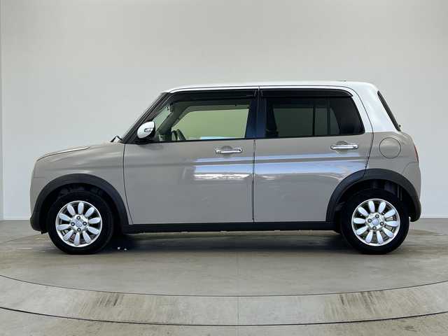 スズキ ラパン X 奈良県 2015(平27)年 6.8万km フォーンベージュメタリック/ホワイト2トーンルーフ 社外8インチナビ/フルセグTV/Bluetoothオーディオ/DVD再生/バックカメラ/衝突軽減ブレーキ/横滑り防止/デジタルインナーミラー型前後ドラレコ/エネチャージ/スマートキー/プッシュスタート/純正キセノンヘッドライト/運転席シートヒーター/ETC/アイドリングストップ/ウインカーミラー