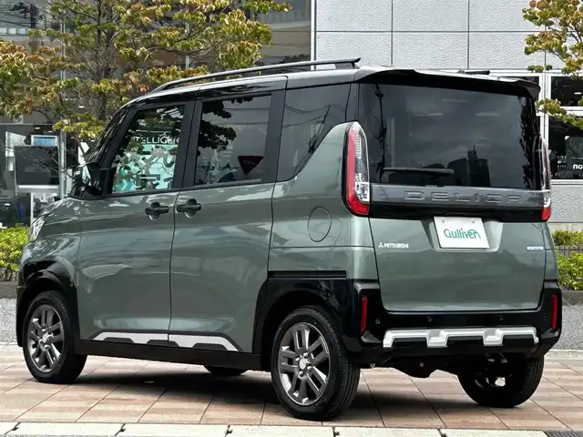 三菱 デリカミニ T プレミアム 福島県 2025(令7)年 0.1千km 緑Ⅱ T　PREMIUM　4WD　9型ディスプレイオーディオ（121/330）　サイドデカール（33/440）/4WD/純正ディスプレイオーディオ/360°カメラ/衝突被害軽減システム/車線逸脱警報/クルーズコントロール/ハーフレザーシート/両側パワースライドドア/横滑り防止装置/ETC/アイドリングストップ/LEDヘッドライト/フォグランプ/オートライト/ウィンカーミラー/電動格納ミラー/純正15インチAW/シートヒーター/シートリフター/ステアリングヒーター/プッシュスタート/スマートキー/フロアマット