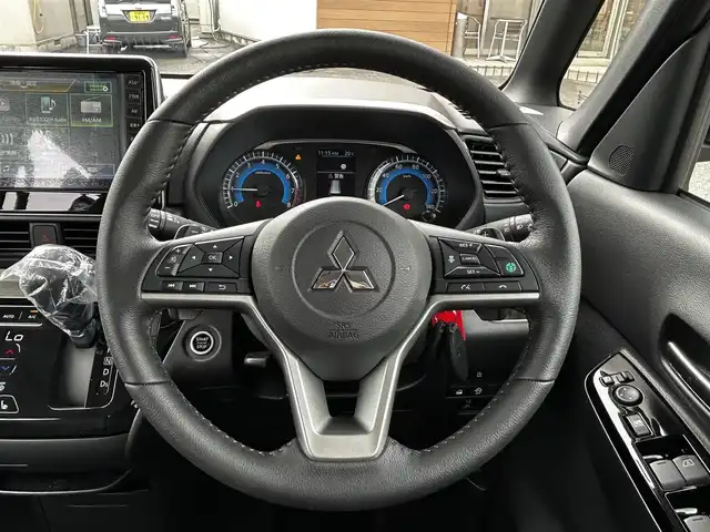 三菱 デリカミニ T プレミアム 福島県 2025(令7)年 0.1千km 緑Ⅱ T　PREMIUM　4WD　9型ディスプレイオーディオ（121/330）　サイドデカール（33/440）/4WD/純正ディスプレイオーディオ/360°カメラ/衝突被害軽減システム/車線逸脱警報/クルーズコントロール/ハーフレザーシート/両側パワースライドドア/横滑り防止装置/ETC/アイドリングストップ/LEDヘッドライト/フォグランプ/オートライト/ウィンカーミラー/電動格納ミラー/純正15インチAW/シートヒーター/シートリフター/ステアリングヒーター/プッシュスタート/スマートキー/フロアマット