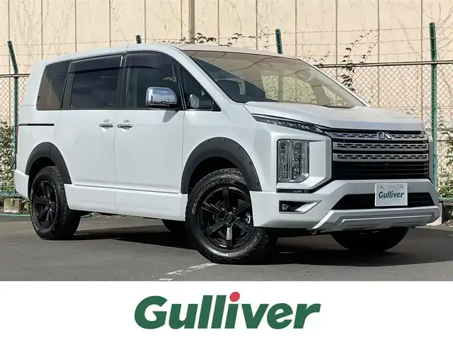 三菱 デリカＤ：５ P 東京都 2022(令4)年 3.1万km ホワイトダイヤモンド 純正10.1型ナビ/KUHL　D5R-RSフロントディフューザー/KUHL　D5R-RSレーシングボンネット/KUHL　D5R-RSリアディレイラー/JAOS　フェンダーガーニッシュType-X/全周囲カメラ/フルセグTV/ETC/前方ドライブレコーダー/電装ステップ/e-Assist/・衝突軽減ブレーキ/・車線逸脱警報システム/・後側方車両検知警報システム/・誤発進抑制機能/・レーダークルーズコントロール/・オートマチックハイビーム/前席シートヒーター/運転席のみパワーシート/ステアリングヒーター/両側パワースライドドア/パワーバックドア/パドルシフト/アイドリングストップ/シートカバー