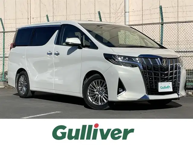 トヨタ アルファード G 東京都 2020(令2)年 6.3万km ラグジュアリーホワイトパールクリスタルシャインガラスフレーク 純正メーカーナビ/純正フリップダウンモニター/全周囲カメラ/フルセグTV/Bluetooth/CD/DVD/USB/JBLサウンドシステム/トヨタセーフティセンス/・プリクラッシュセーフティシステム/・横滑り防止装置/・車線逸脱警報装置/・レーダークルーズコントロール/・デジタルインナーミラー/ブラインドスポットモニター/両側電動スライドドア/前席シートヒーター、前席シートクーラー/クリアランスソナー/パワーバックドア/オットマン/アドバンスドパーク/前席パワーシート(運転席メモリーシート)/スマートキー/純正マット