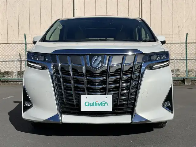トヨタ アルファード G 東京都 2020(令2)年 6.3万km ラグジュアリーホワイトパールクリスタルシャインガラスフレーク 純正メーカーナビ/純正フリップダウンモニター/全周囲カメラ/フルセグTV/Bluetooth/CD/DVD/USB/JBLサウンドシステム/トヨタセーフティセンス/・プリクラッシュセーフティシステム/・横滑り防止装置/・車線逸脱警報装置/・レーダークルーズコントロール/・デジタルインナーミラー/ブラインドスポットモニター/両側電動スライドドア/前席シートヒーター、前席シートクーラー/クリアランスソナー/パワーバックドア/オットマン/アドバンスドパーク/前席パワーシート(運転席メモリーシート)/スマートキー/純正マット