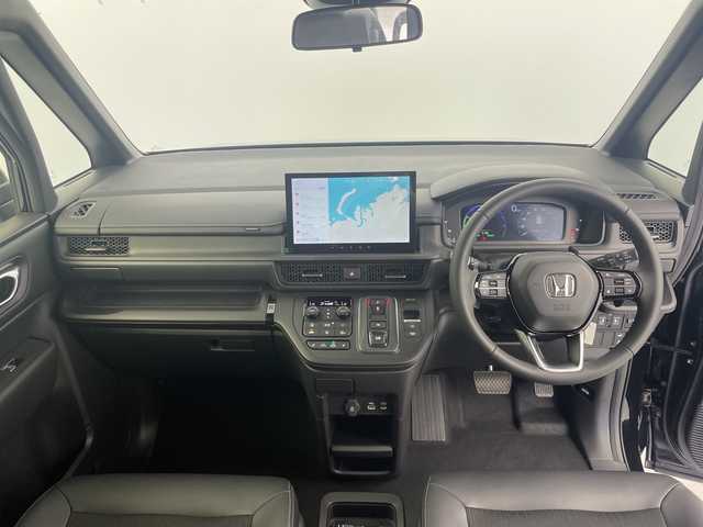 ホンダ ステップワゴン スパーダ eHEV 愛知県 2025(令7)年 0.1万km クリスタルブラックパール 11インチナビ/Bluetooth/ホンダセンシング /レーダークルーズコントロール/パドルシフト/オートライト/LEDライト/シートヒーター（D/N）/両側パワースライドドア/パワーバックドア/スマートキー