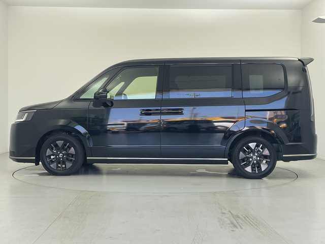 ホンダ ステップワゴン スパーダ eHEV 愛知県 2025(令7)年 0.1万km クリスタルブラックパール 11インチナビ/Bluetooth/ホンダセンシング /レーダークルーズコントロール/パドルシフト/オートライト/LEDライト/シートヒーター（D/N）/両側パワースライドドア/パワーバックドア/スマートキー