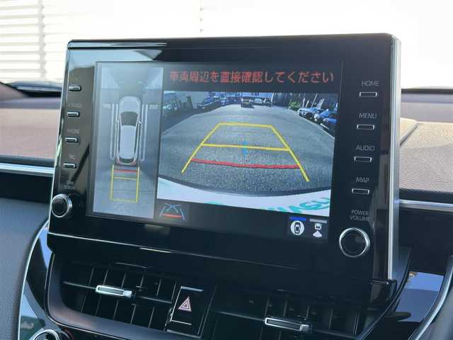 トヨタ カローラ クロス ハイブリッド Z 大阪府 2023(令5)年 1万km プラチナホワイトパールマイカ ワンオーナー/OP：パノラマサンルーフ/OP：９インチディスプレイオーディオ＋ナビキット/・AM/FM/BT/フルセグ（テレビキャンセラー）/OP：パノラミックビューモニター/OP：ブラインドスポットモニター/OP：パーキングサポートブレーキ/OP：ステアリングヒーター/OP：寒冷地仕様/トヨタセーフティーセンス/・プリクラッシュセーフティー/・レーントレーシングアシスト/・レーダークルーズコントロール/・オートマチックハイビーム/・ロードサインアシスト/ハーフレザーシート/パワーシート/シートヒーター/ハンズフリーパワーバックドア/前後ドラレコ（TZ-DR210）/ETC2/0/純正ドアバイザー/純正フロアマット/純正18インチアルミホイール/取扱説明書/保証書/記録簿R5/R6/R7/スペアキー