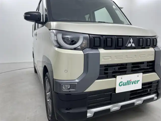 三菱 デリカミニ T プレミアム 福井県 2025(令7)年 0.1千km アイボリーⅡ 届出済み未使用車/4WD/純正９インチディスプレイオーディオ/Bluetooth/USB/HDMI/AppleCarPlay/AndroidAuto/AM/FM/３Dマルチアラウンドビューモニター/マイパイロット/・レーダークルーズコントロール/・衝突被害軽減ブレーキシステム（ＦＣＭ）/・車線逸脱警報システム（ＬＤＷ）/・オートマチックハイビーム（ＡＨＢ）/・後側方車両検知警報システム（ＢＳＷ／ＬＣＡ）/・コーナーセンサー/デジタルインナーミラー/前後ドライブレコーダー/純正オプションサイドデカール/両側パワースライドドア/ハーフレザーシート/前席シートヒーター/パドルシフト/ステアリングヒーター/ステアリングスイッチ/アダプティブLEDヘッドライト/LEDフォグランプ/電動格納式ヒーテッドドアミラー/リアサーキュレーター/ダウンヒルアシストコントロール/アイドリングストップ/横滑り防止機能/プッシュスタート/スマートキー×2/純正15インチAW/ロールサンシェード/シートバックテーブル