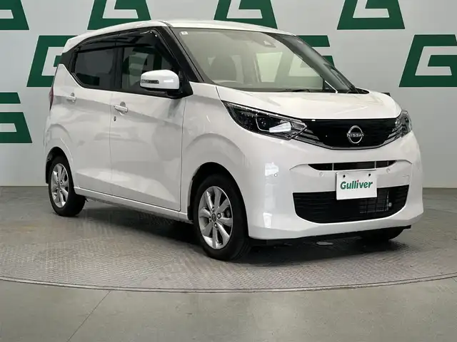 日産 デイズ X 鹿児島県 2024(令6)年 1.1万km ホワイトパール オーディオ　/全方位カメラ　/バックカメラ　/衝突軽減ブレーキ　/アイドリングストップ　/前後コーナーセンサー　/ステアリングリモコン/ＬＥＤヘッドライト　/ヘッドライトレベライザー　/ＵＳＢ充電ソケット　/禁煙